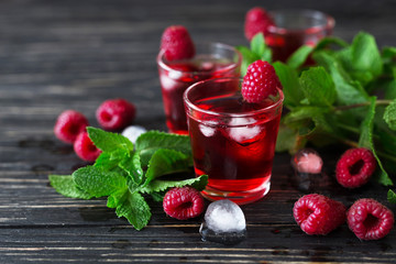 Fresh cocktail with raspberry, mint and ice