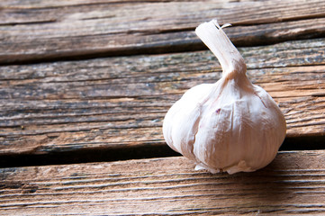 Garlic on wooden background