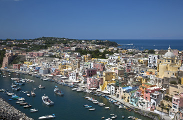 Fototapeta na wymiar Island of Procida, italy. The colorful Marina di Coricella, small fisherman village 
