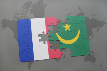 puzzle with the national flag of france and mauritania on a world map background.