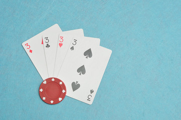 The different suits of a the number 3 card in a deck of cards di