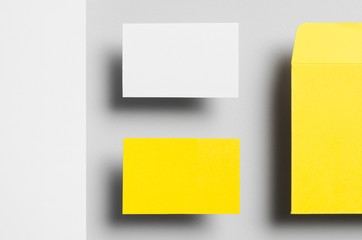 Branding / Stationery Mock-Up - Yellow & White. Close-Up. Floating - Letterhead (A4), DL Envelope, Business Cards (85x55mm)