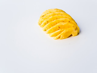 Pineapple, peeled and cut in half