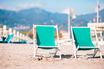 Deckchairs on european beach in Italy