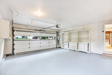 Empty garage interior in American house - 117946473