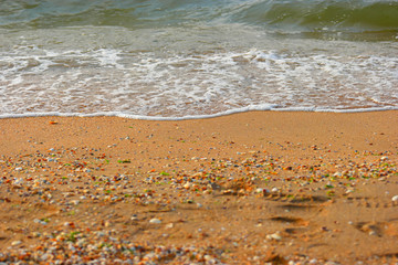 Wave of the sea on the sand beach