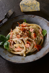 Pasta with smoked salmon, gorgonzol and roasted sunflower seeds