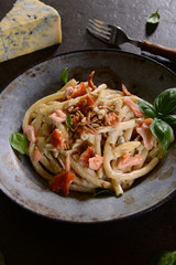 Pasta with smoked salmon, gorgonzol and roasted sunflower seeds