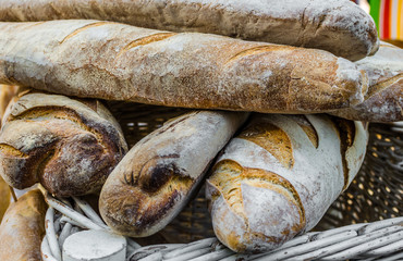 Organic bread loafs at a street food market. Selective focus