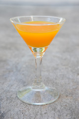 Vertical image of orange juice
