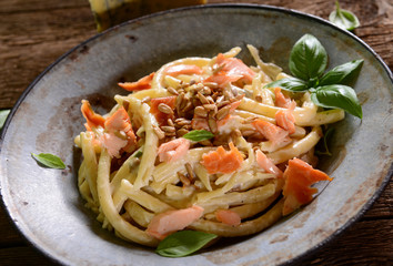 Pasta with smoked salmon, gorgonzol and roasted sunflower seeds