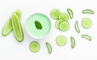 Natural ingredient for skincare and scrub with cucumber, avocado and mint isolated on white background