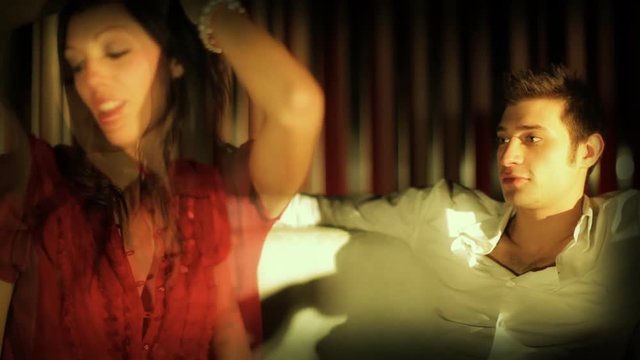 Young couple firting in VIP club space