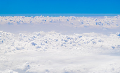 Fototapeta na wymiar Aerial view of big cloudy and sky from airplane,Nature backgroun