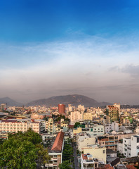 VIETNAM, NHA TRANG. MAY 8, 2015. The residential area of the spa town in the rays of the dawn sun.