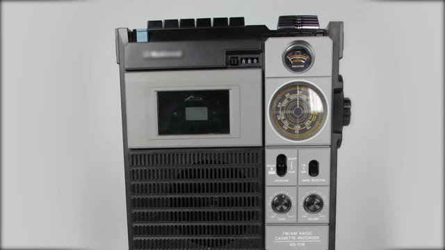 retro radio cassette player spinning around
