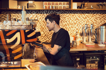 Barista at work in a coffee shop