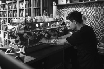 Barista at work in a coffee shop