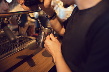 Barista at work in a coffee shop