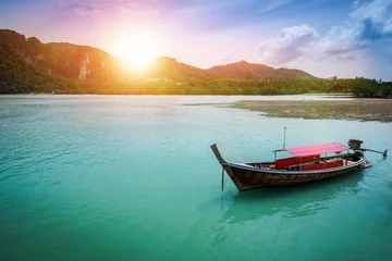Foto op Plexiglas the boat on the sea with sunset light in evening  at Krabi provi © borphloy