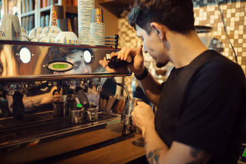Barista at work in a coffee shop