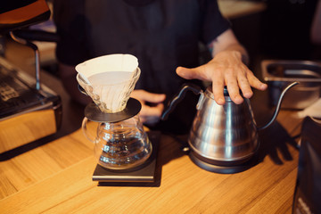 Barista at work in a coffee shop