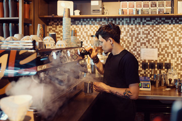 Barista at work in a coffee shop