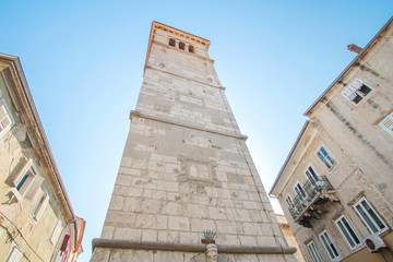 Fototapeta na wymiar Tower bell of St Mary's church in old town Cres, Croatia 