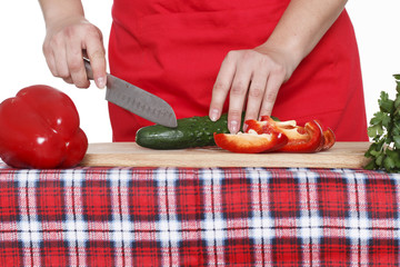 Woman's hands cutting vegetables