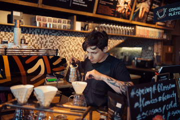 Barista at work in a coffee shop