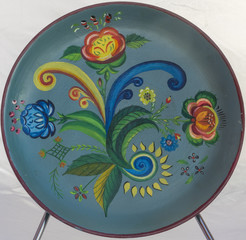 Naklejka premium Rosemåling, or rosemaling is the name of a traditional form of decorative folk art that originated in the rural valleys of Norway