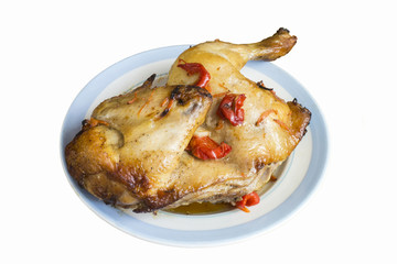Roasted meat of the hen in plate on table