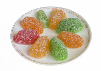 Sweet fruit jellies on plate