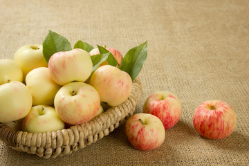 ripe apples in a beautiful wicker basket
