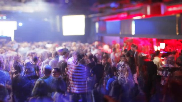 crowd dancing in a night club