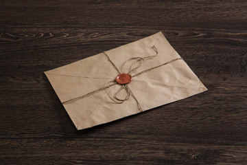 Letter with seal on table