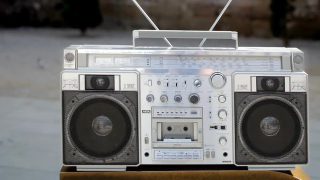 retro stereo ghettoblaster in different urban locations