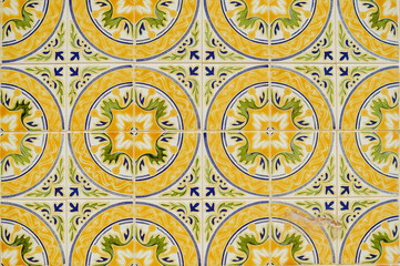 Exterior old house facade detail of the azulejo traditional tiles in Portugal. Abstract background