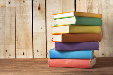 Stack of colorful books. Education background. Back to school. Copy space for text.