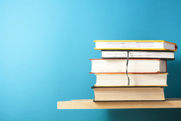 Stack of colorful books. Education background. Back to school. Copy space for text.