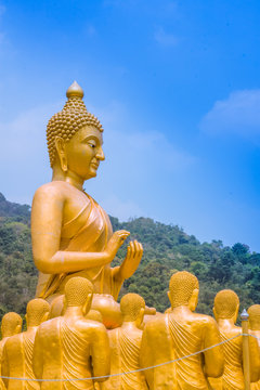  buddha with blue sky  in Thailand