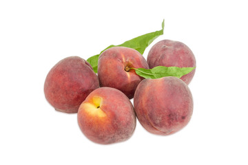 Several peaches on a light background