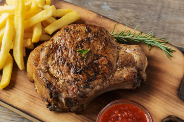 steak on the bone steak with french fries and sauce © koss13