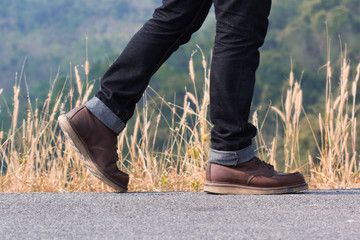 a man walking on the road