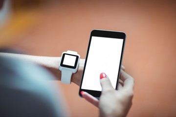 Mature student using mobile phone