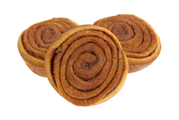 Pecan sweet rolls on a white background side view.