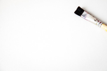 Paint brush on white background with space