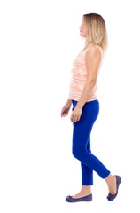 back view of walking  woman. beautiful blonde girl in motion.  backside view of person.  Rear view people collection. Isolated over white background. The blonde in a pink jacket thoughtfully goes