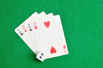 The different suit of the number 2 cards in a deck of cards disp