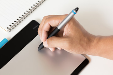 close up hand writting on graphic tablet